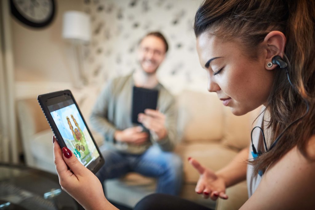 BfB Labs of Macclesfield will soon be launching a a new game using Emotionally Responsive Gaming (ERG) players wear a small ear-clip (BfB Sensor), which measures vital life signs such as heart rate, pulse and breathing. Pictured friends playing the game on their tables